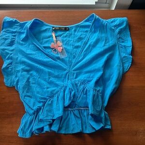 Blue linen new with tags peplum top.